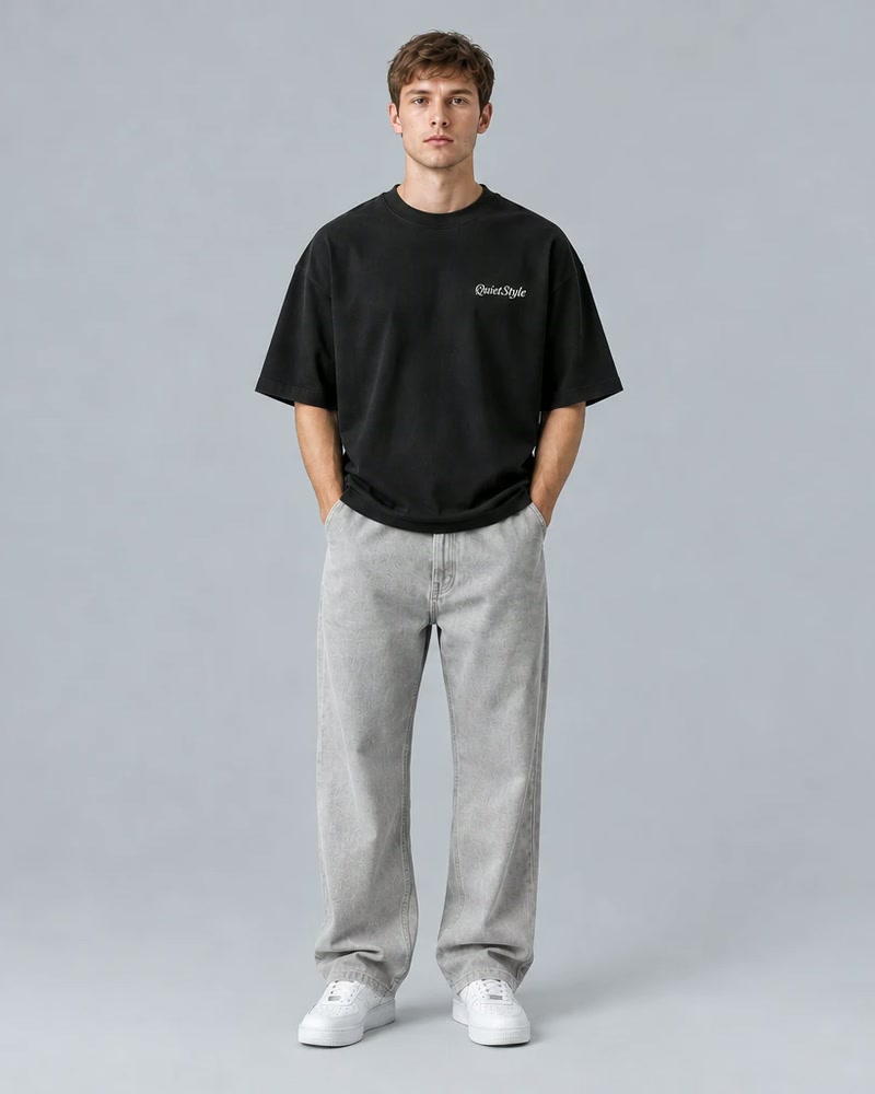 Black tee with a small QuietStyle logo on the chest